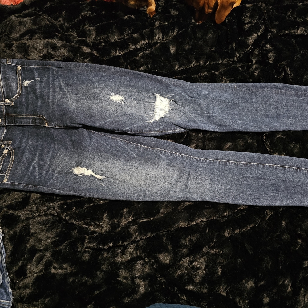 Distressed Blue Jeans